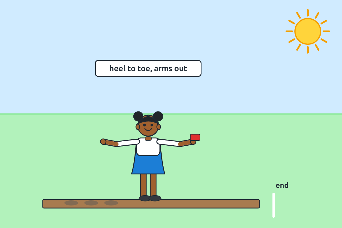 A child walking on a low wooden beam on the ground carrying a beanbag