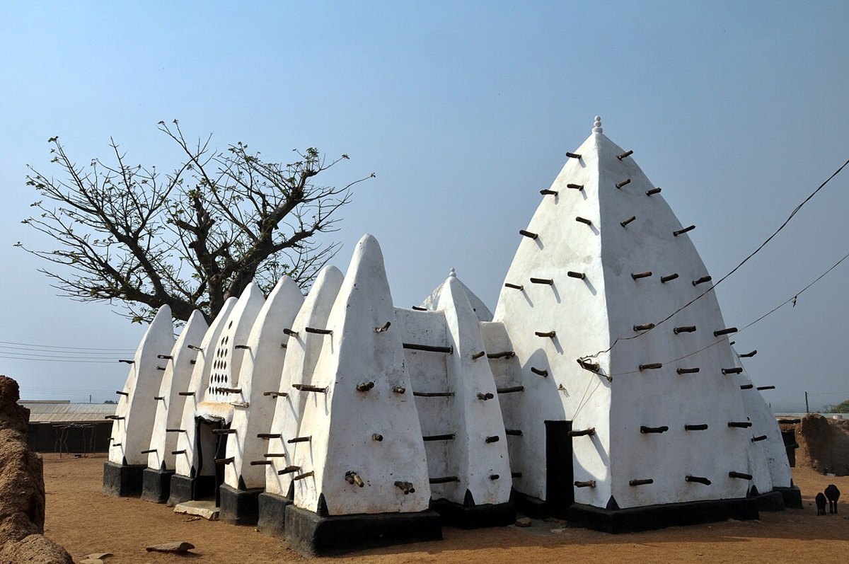 Larabanga Mosque, a white mud mosque with wooden beams