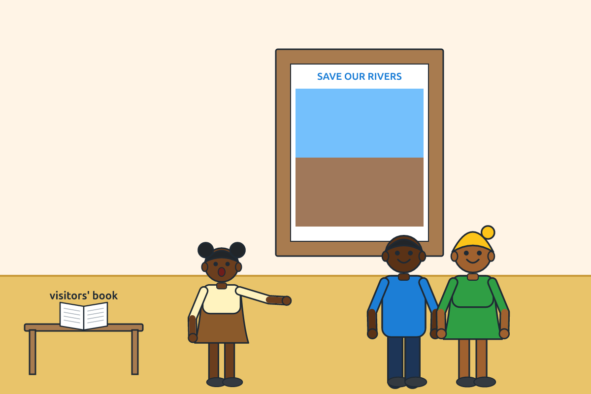 A pupil explaining an artwork to visiting parents