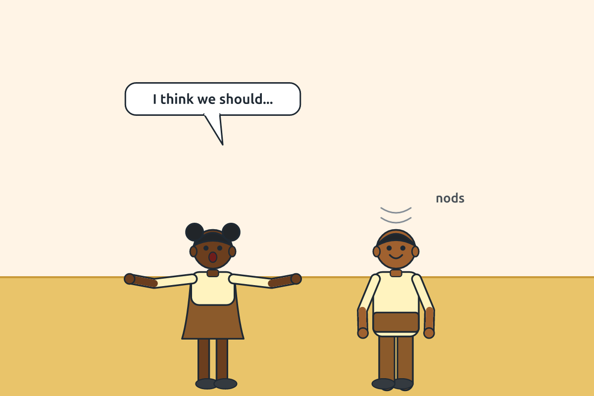 Two pupils talking with gestures