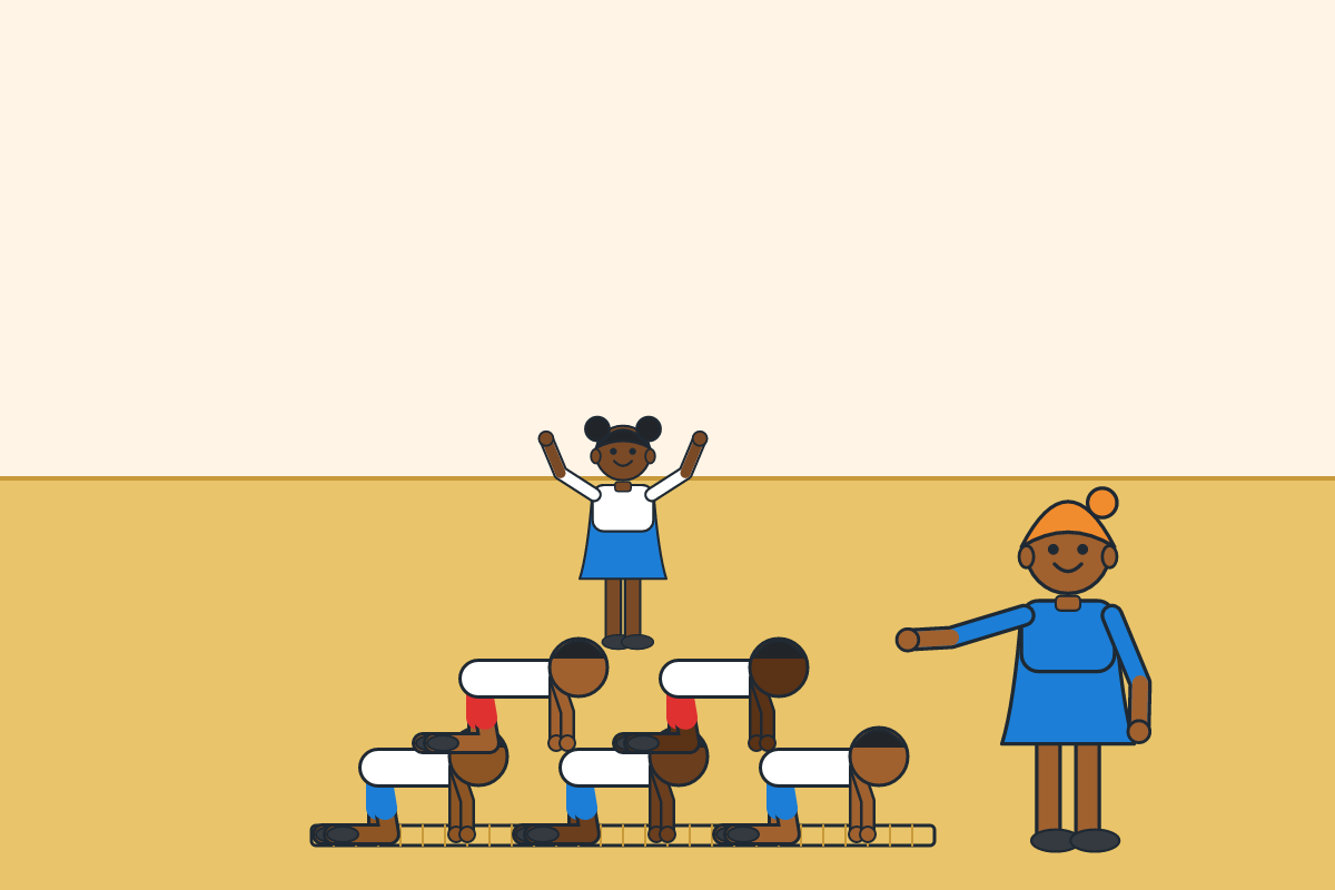 Pupils forming a three-level human pyramid on a mat